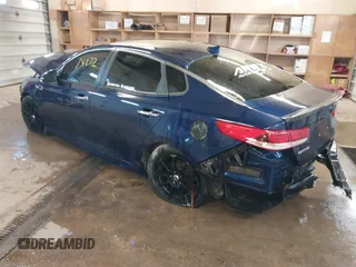 2016 Kia Optima LX with VIN 5XXGT4L33GG026572, listed as a IAAI auction lot 41514872 with 135,423 mi miles. Bid and sale history available at carsss.com. Image 3.