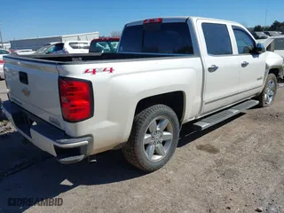 2015 Chevrolet Silverado 1500 High Country with VIN 3GCUKTEJ2FG434388, listed as a IAAI auction lot 41677014 with 117,959 mi miles. Bid and sale history available at carsss.com. Image 4.