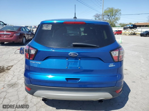 2017 Ford Escape SE with VIN 1FMCU9GD3HUD73757, listed as a Copart auction lot 52495265 with 144,098 mi miles and Clean Title. Bid and sale history available at carsss.com. Image 6.