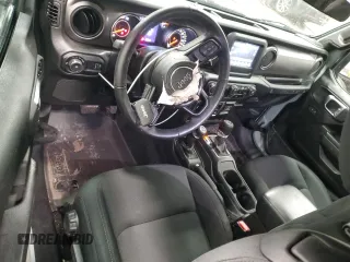 2023 Jeep Wrangler Sport with VIN 1C4HJXAG7PW617021, listed as a Copart auction lot 59928305 with 8,503 mi miles and Salvage title. Bid and sale history available at DreamBid. Image 8.