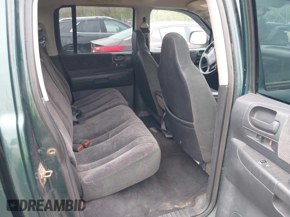 2001 Dodge Dakota Sport z VIN 1B7HG2ANX1S256902, wystawiony jako IAAI lot #42037703 z przebiegiem 121 914 mil mil oraz . Historia ofert i sprzedaży dostępna na DreamBid. Obrazek 8.