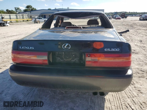 1996 Lexus ES 300 с VIN JT8BF12G4T0160599, выставлен на аукционе Copart как лот 87287404 с пробегом 132 013 миль миль и Списание • Salvage title. История ставок и продаж доступна на DreamBid. Изображение 6.