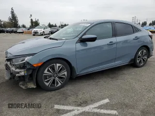 2021 Honda Civic Sport with VIN SHHFK7H4XMU422397, listed as a Copart auction lot 50767515 with 87,010 mi miles and Salvage Title. Bid and sale history available at DreamBid. Image 1.