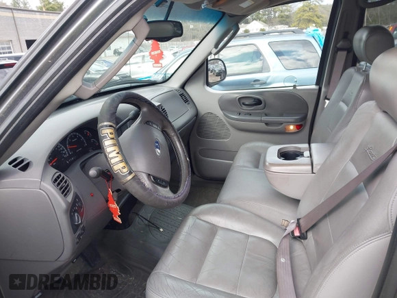 2003 Ford F-150 XLT with VIN 1FTRW08L63KA37275, listed as a IAAI auction lot 41875128 with 133,257 mi miles. Bid and sale history available at carsss.com. Image 5.