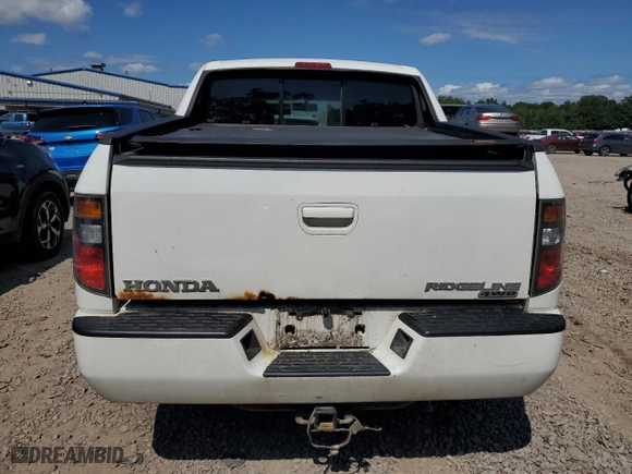 2006 Honda Ridgeline RTS with VIN 2HJYK16486H555131, listed as a Copart auction lot 69010114 with 123,861 mi miles and Salvage Title. Bid and sale history available at carsss.com. Image 6.