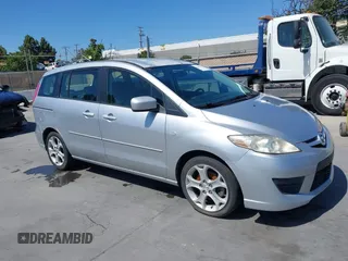 2009 Mazda 5 Touring z VIN JM1CR29L090334702, wystawiony jako IAAI lot #42349375 z przebiegiem 188 173 mil mil oraz . Historia ofert i sprzedaży dostępna na DreamBid. Obrazek 1.