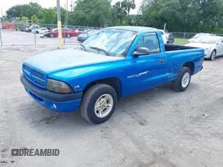 2000 Dodge Dakota z VIN 1B7FL26X1YS799143, wystawiony jako IAAI lot #42303206 z przebiegiem 148 576 mil mil oraz . Historia ofert i sprzedaży dostępna na DreamBid. Obrazek 17.
