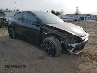 2025 Tesla Model Y Long Range z VIN 7SAYGDEE7SF288570, wystawiony jako Copart lot #48596345 z przebiegiem 4 366 mil mil oraz Szkoda całkowita • Salvage title. Historia ofert i sprzedaży dostępna na DreamBid. Obrazek 4.