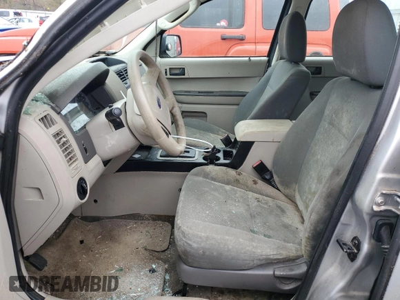 2009 Ford Escape XLS with VIN 1FMCU02779KB55136, listed as a Copart auction lot 81513864 with 108,906 mi miles and Salvage title. Bid and sale history available at DreamBid. Image 7.