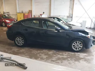 2016 Mazda 3 i Touring with VIN JM1BM1V74G1306843, listed as a IAAI auction lot 42358429 with 168,412 mi miles and . Bid and sale history available at DreamBid. Image 13.