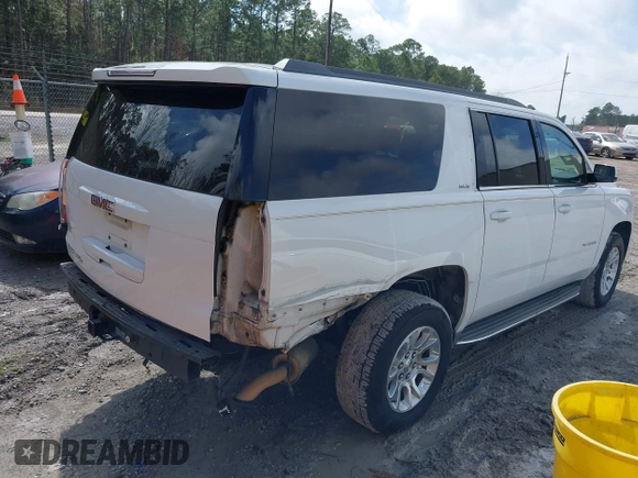 2016 GMC Yukon XL SLE with VIN 1GKS1FKC0GR331459, listed as a IAAI auction lot 41557718 with 203,803 mi miles. Bid and sale history available at carsss.com. Image 4.