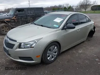 2014 Chevrolet Cruze LS with VIN 1G1PA5SG1E7391492, listed as a IAAI auction lot 41951818 with 103,285 mi miles and . Bid and sale history available at DreamBid. Image 17.