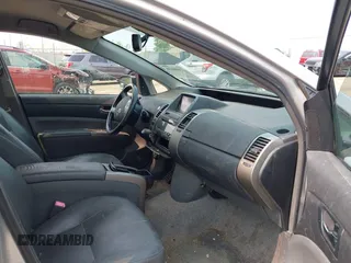 2007 Toyota Prius z VIN JTDKB20U677694177, wystawiony jako IAAI lot #42408658 z przebiegiem 261 175 mil mil oraz . Historia ofert i sprzedaży dostępna na DreamBid. Obrazek 5.