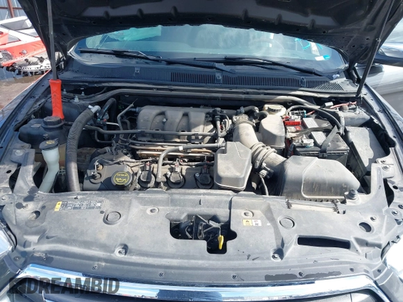 2015 Ford Taurus Limited с VIN 1FAHP2F82FG110285, выставлен на аукционе IAAI как лот 41731926 с пробегом 173 645 миль миль и . История ставок и продаж доступна на DreamBid. Изображение 10.