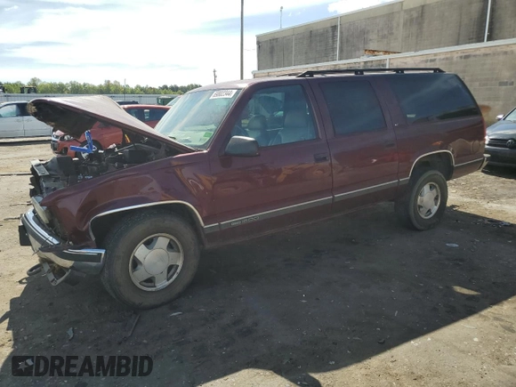 1998 GMC Suburban z VIN 3GKFK16R1WG503206, wystawiony jako Copart lot #69802344 z przebiegiem 231 148 mil mil oraz Szkody całkowita. Historia ofert i sprzedaży dostępna na DreamBid. Obrazek 1.