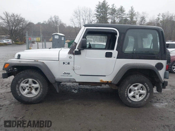 2006 Jeep Wrangler X with VIN 1J4FA39SX6P709588, listed as a IAAI auction lot 41927435 with 227,990 mi miles. Bid and sale history available at carsss.com. Image 14.