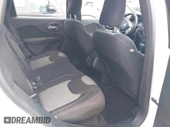 2016 Jeep Cherokee Altitude with VIN 1C4PJLAB4GW290666, listed as a IAAI auction lot 42052140 with 77,116 mi miles. Bid and sale history available at carsss.com. Image 8.
