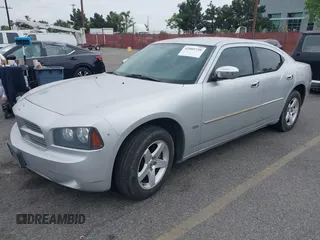 2010 Dodge Charger SXT with VIN 2B3CA3CVXAH307483, listed as a IAAI auction lot 42005739 with 165,844 mi miles and . Bid and sale history available at carsss.com. Image 2.
