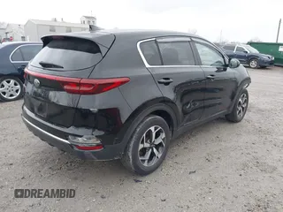 2020 Kia Sportage LX with VIN KNDPM3AC2L7784884, listed as a IAAI auction lot 41037307 with 46,030 mi miles and . Bid and sale history available at DreamBid. Image 4.