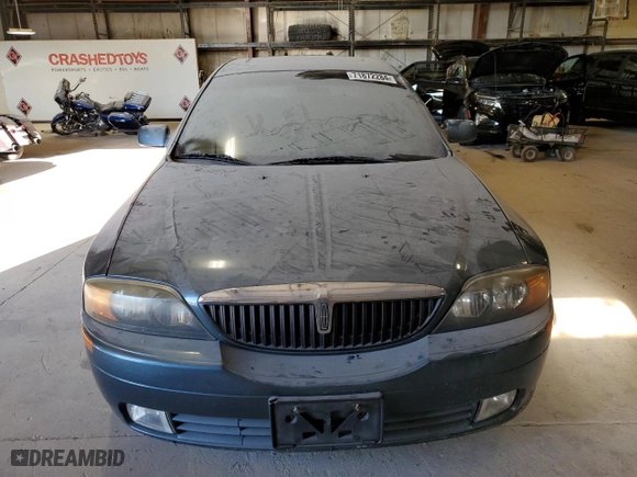2002 Lincoln LS w/Base Pkg with VIN 1LNHM87A02Y625020, listed as a Copart auction lot 71872284 with 128,473 mi miles and Clean Title. Bid and sale history available at carsss.com. Image 5.