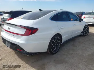 2021 Hyundai Sonata N Line with VIN 5NPEK4JC5MH128470, listed as a IAAI auction lot 41260324 with 58,488 mi miles. Bid and sale history available at carsss.com. Image 4.