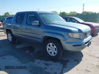 2006 Honda Ridgeline RTL with VIN 2HJYK16526H554016, listed as a IAAI auction lot 42053277 with 220,316 mi miles. Bid and sale history available at carsss.com. Image 1.