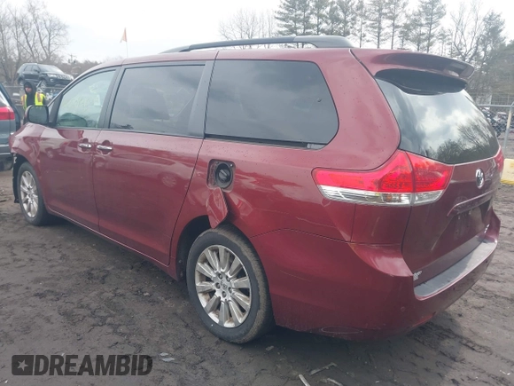 2013 Toyota Sienna XLE with VIN 5TDDK3DC5DS067049, listed as a IAAI auction lot 41650425 with 128,380 mi miles and . Bid and sale history available at DreamBid. Image 3.