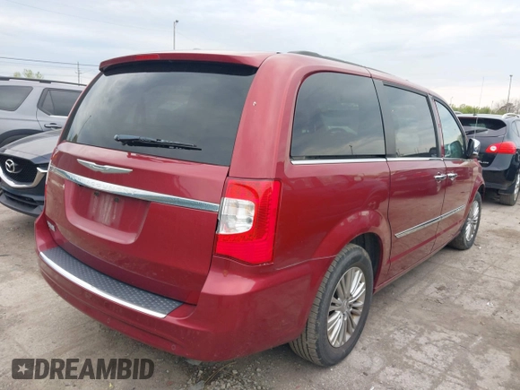 2015 Chrysler Town & Country Touring-L with VIN 2C4RC1CG6FR582911, listed as a IAAI auction lot 42117864 with 137,689 mi miles. Bid and sale history available at carsss.com. Image 4.