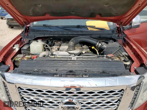 2016 Nissan Titan SL z VIN 1N6BA1F4XGN500750, wystawiony jako Copart lot #57608135 z przebiegiem 126 525 mil mil oraz Czysty tytuł • Clean title. Historia ofert i sprzedaży dostępna na DreamBid. Obrazek 11.