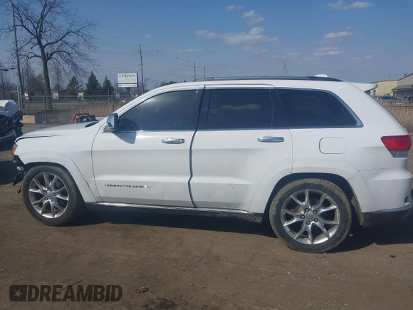 2015 Jeep Grand Cherokee Summit with VIN 1C4RJFJGXFC734025, listed as a IAAI auction lot 41842927 with 137,993 mi miles. Bid and sale history available at carsss.com. Image 14.