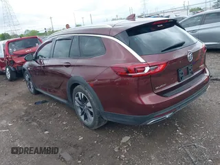 2018 Buick Regal Essence with VIN W04GV8SXXJ1122153, listed as a IAAI auction lot 42112879 with 70,408 mi miles and . Bid and sale history available at DreamBid. Image 3.