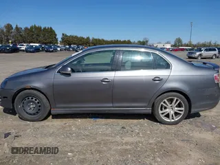 2006 Volkswagen Jetta Sedan 2.5L with VIN 3VWSG71K26M740777, listed as a IAAI auction lot 41743566 with 164,174 mi miles. Bid and sale history available at carsss.com. Image 14.