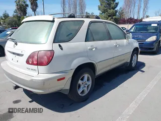 1999 Lexus RX 300 Luxury SUV with VIN JT6HF10U0X0092593, listed as a IAAI auction lot 41974376 with 111,003 mi miles. Bid and sale history available at carsss.com. Image 4.