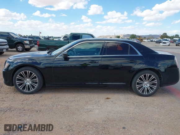 2014 Chrysler 300 S with VIN 2C3CCABG5EH205020, listed as a IAAI auction lot 42247180 with 186,458 mi miles and . Bid and sale history available at DreamBid. Image 13.