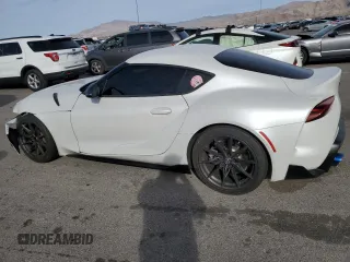 2023 Toyota GR Supra 3.0 with VIN WZ1DB0G00PW055929, listed as a Copart auction lot 76407574 with 16,889 mi miles and Salvage Title. Bid and sale history available at carsss.com. Image 2.