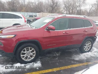 2014 Jeep Cherokee Latitude with VIN 1C4PJMCB8EW166853, listed as a IAAI auction lot 41579386 with 251,683 mi miles and . Bid and sale history available at DreamBid. Image 14.
