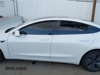2018 Tesla Model 3 Long Range Battery with VIN 5YJ3E1EA3JF023300, listed as a IAAI auction lot 41925504 with 100,512 mi miles and . Bid and sale history available at DreamBid. Image 15.
