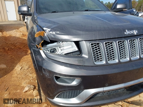 2015 Jeep Grand Cherokee Summit with VIN 1C4RJFJG8FC679185, listed as a IAAI auction lot 41653531 with 158,186 mi miles and . Bid and sale history available at DreamBid. Image 6.