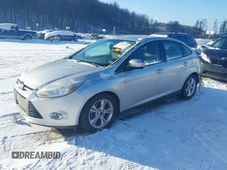 2012 Ford Focus SE with VIN 1FAHP3F27CL457213, listed as a IAAI auction lot 41303904 with 215,044 mi miles and . Bid and sale history available at DreamBid. Image 17.