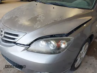 2004 Mazda 3 s with VIN JM1BK343441217463, listed as a IAAI auction lot 41957324 with 219,311 mi miles and . Bid and sale history available at DreamBid. Image 13.