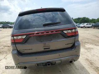 2015 Dodge Durango Limited with VIN 1C4RDJDG0FC904897, listed as a Copart auction lot 58985025 with 147,139 mi miles and Salvage title. Bid and sale history available at DreamBid. Image 6.