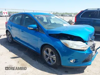 2014 Ford Focus SE with VIN 1FADP3K20EL383687, listed as a IAAI auction lot 42004089 with 127,374 mi miles. Bid and sale history available at carsss.com. Image 1.