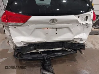 2013 Toyota Sienna LE with VIN 5TDJK3DC2DS049479, listed as a IAAI auction lot 41322671 with 108,436 mi miles and . Bid and sale history available at DreamBid. Image 6.
