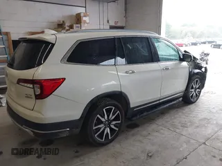 2019 Honda Pilot Elite with VIN 5FNYF6H08KB054725, listed as a IAAI auction lot 40496860 with 91,284 mi miles and . Bid and sale history available at DreamBid. Image 4.