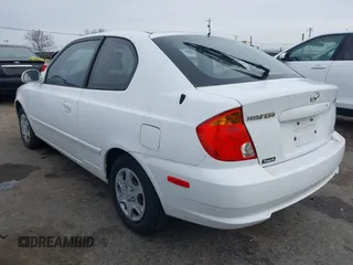 2005 Hyundai Accent GLS with VIN KMHCG35C45U327283, listed as a IAAI auction lot 41585862 with 85,791 mi miles. Bid and sale history available at carsss.com. Image 3.