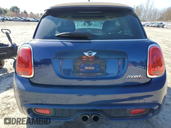 2014 MINI Hardtop S z VIN WMWXM7C53ET731270, wystawiony jako Copart lot #52058595 z przebiegiem 79 455 mil mil oraz Czysty tytuł • Clean title. Historia ofert i sprzedaży dostępna na DreamBid. Obrazek 6.