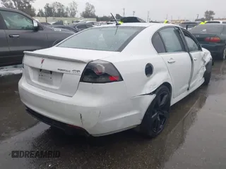 2009 Pontiac G8 GT with VIN 6G2EC57Y99L231004, listed as a IAAI auction lot 41572279 with 104,532 mi miles. Bid and sale history available at carsss.com. Image 4.