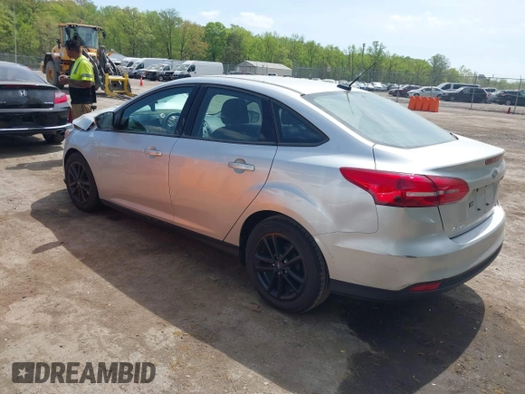 2016 Ford Focus SE with VIN 1FADP3F23GL373801, listed as a IAAI auction lot 42083360 with 52,993 mi miles and . Bid and sale history available at DreamBid. Image 3.