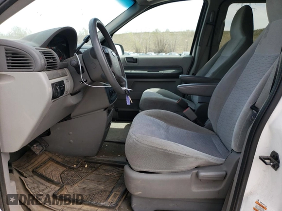 2004 Ford Freestar SE z VIN 2FMDA51644BA32951, wystawiony jako Copart lot #54115905 z przebiegiem 90 629 mil mil oraz Szkoda całkowita • Salvage title. Historia ofert i sprzedaży dostępna na DreamBid. Obrazek 7.