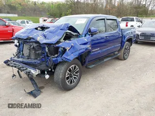 2023 Toyota Tacoma SR z VIN 3TMCZ5AN1PM589061, wystawiony jako IAAI lot #41936717 z przebiegiem 41 395 mil mil oraz . Historia ofert i sprzedaży dostępna na DreamBid. Obrazek 17.